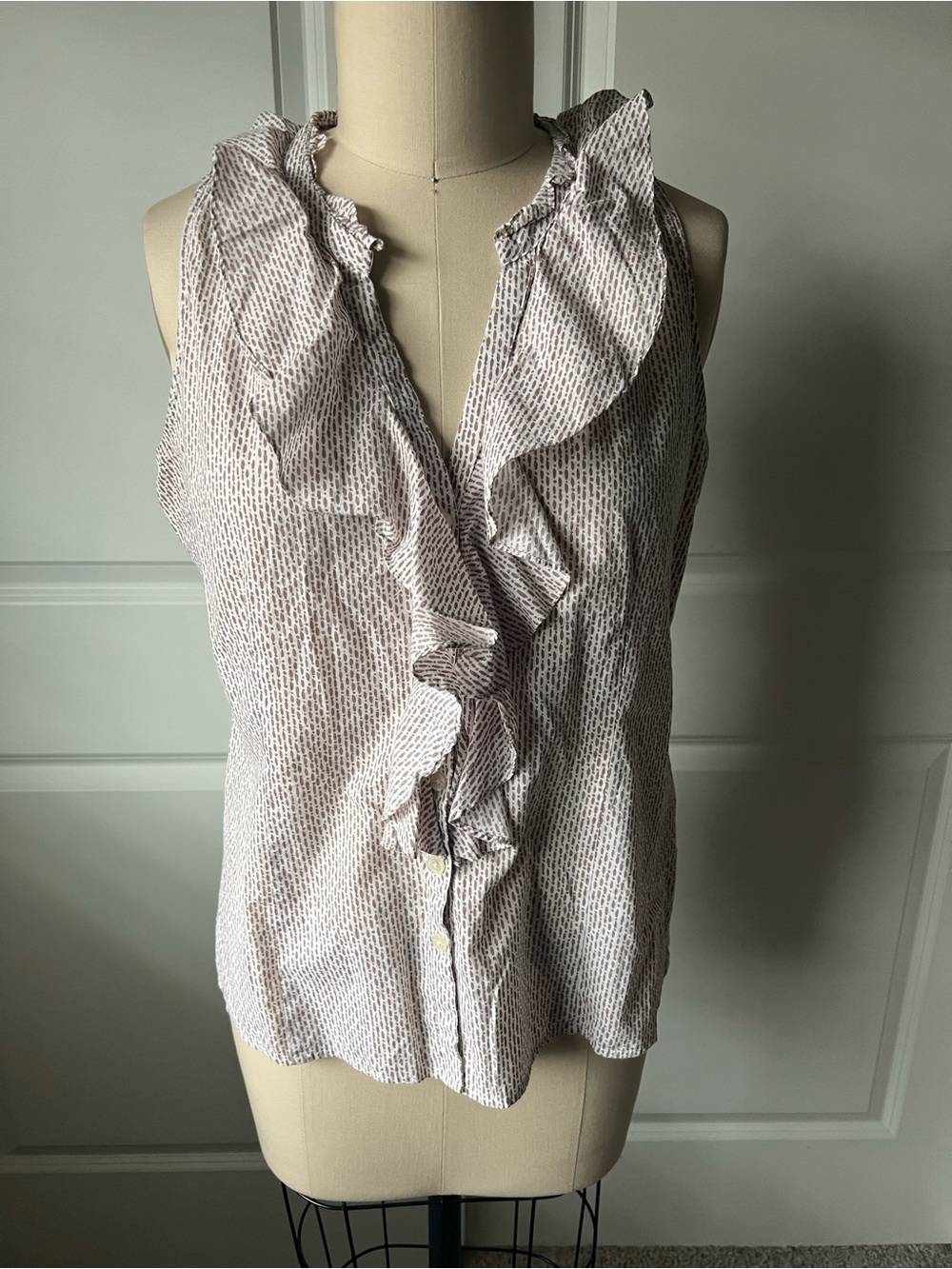 Ruffled Sleeveless Blouse in White and Tan